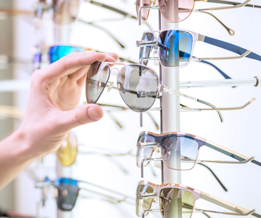 Selecting a pair of sunglasses